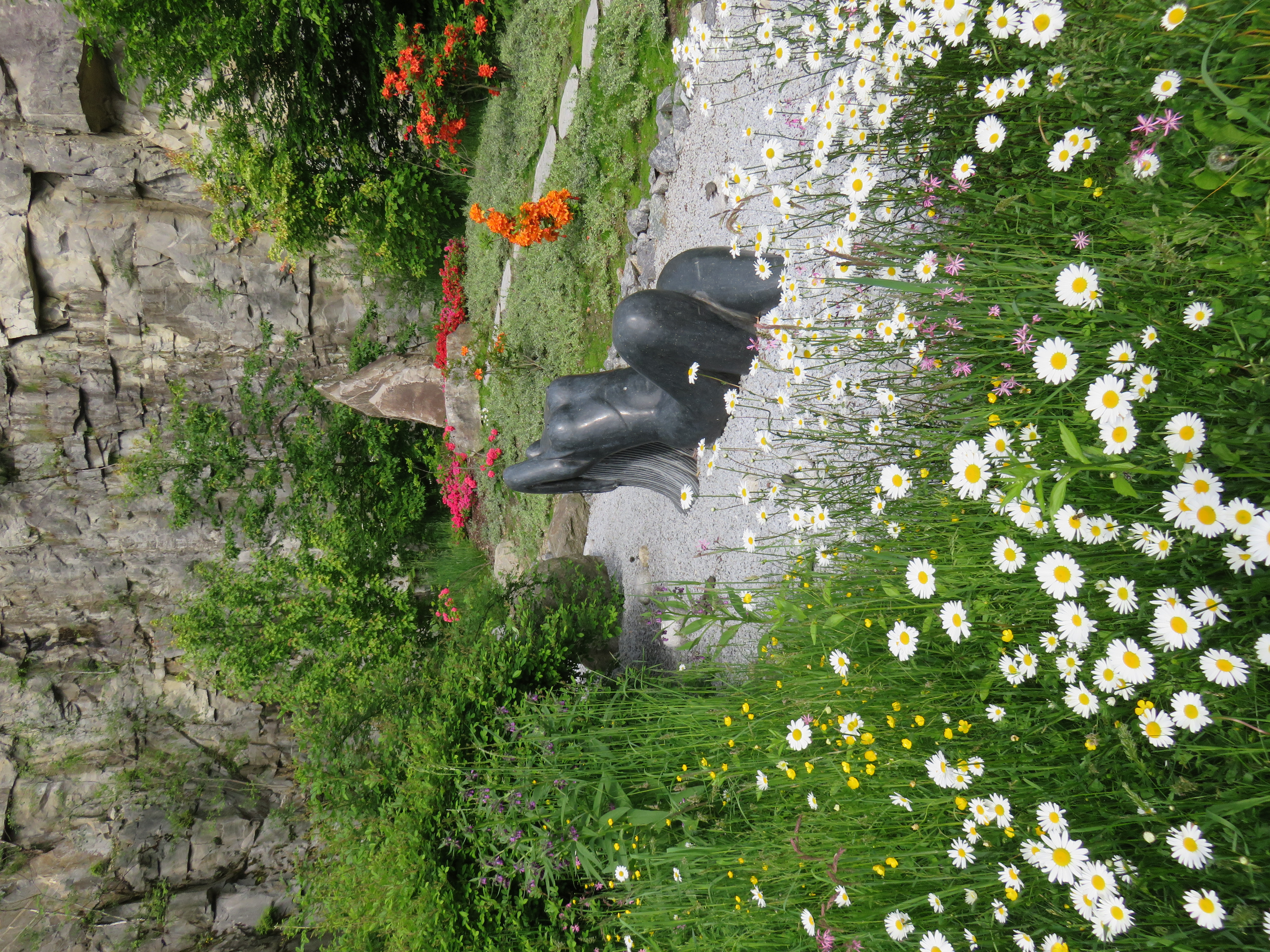 Wasserlauf mit Nixe und flammenden Stein